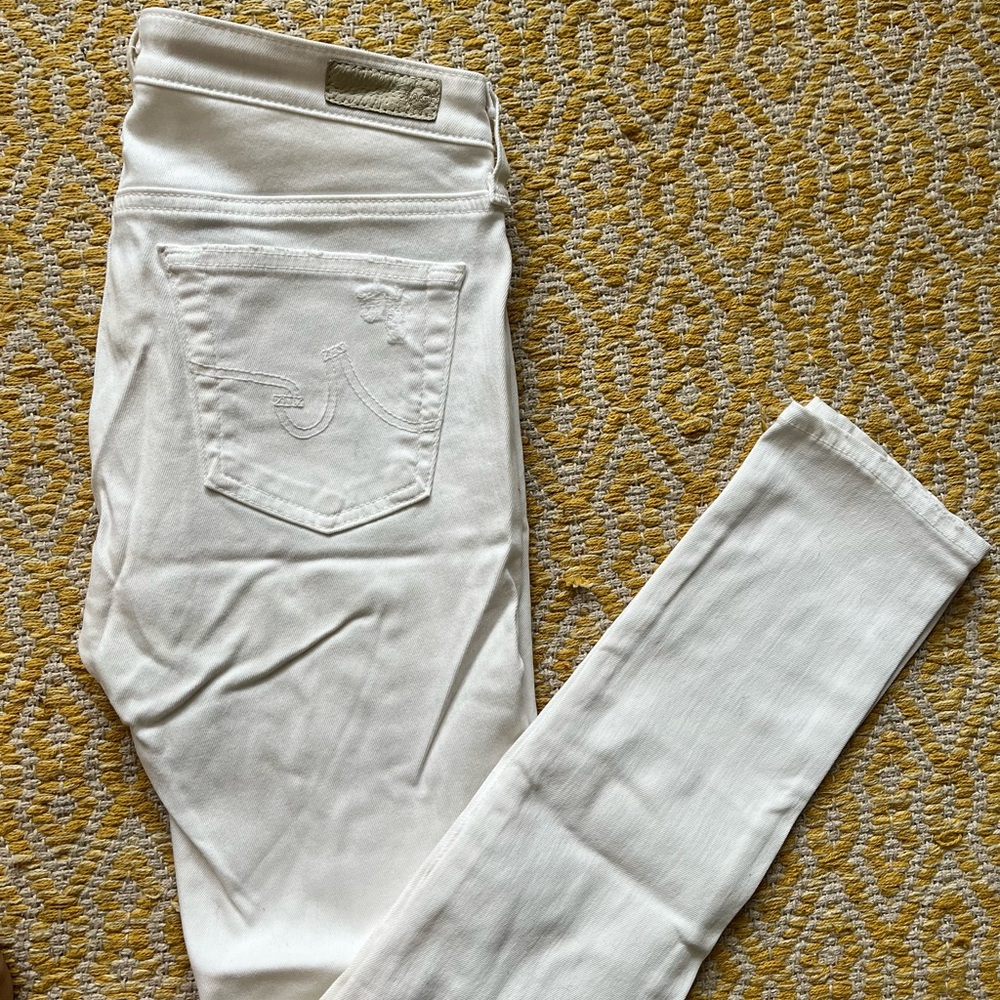 AG white ripped midrise skinny jeans